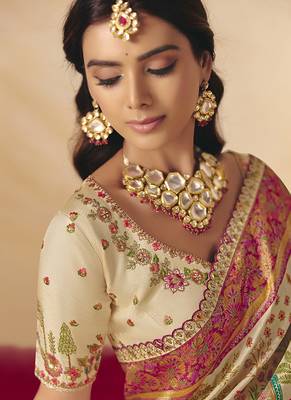 Cream embroidered silk blend saree 2