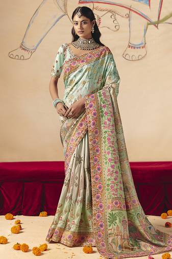 Aqua blue embroidered silk blend saree