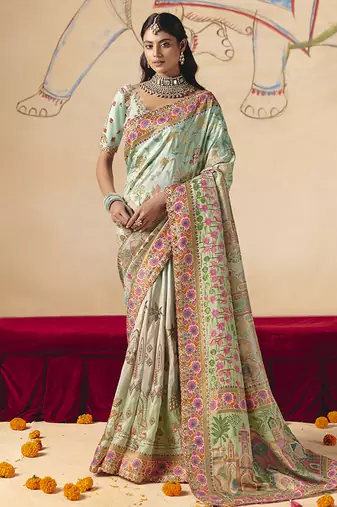 Aqua blue embroidered silk blend saree