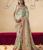 Aqua blue embroidered silk blend saree