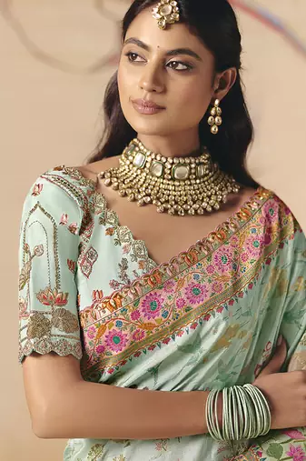 Aqua blue embroidered silk blend saree