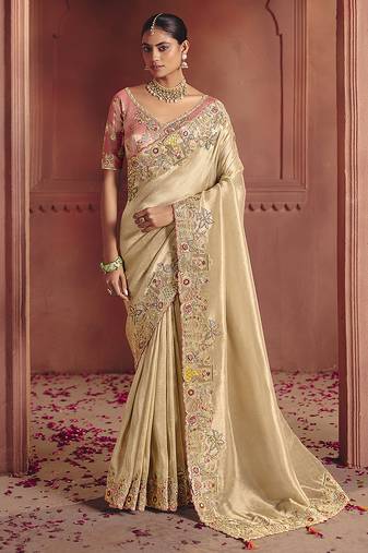 Cream silk blend embroidered saree