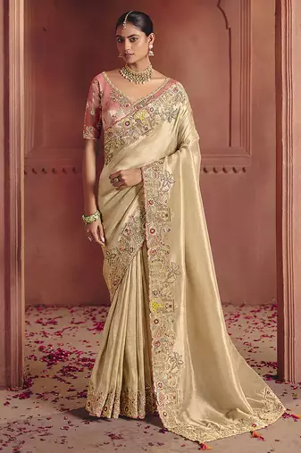 Cream silk blend embroidered saree