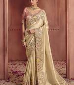 Cream silk blend embroidered saree