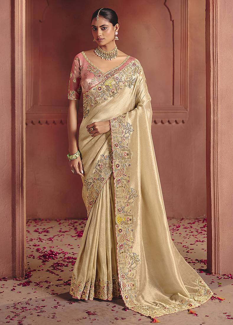 Cream silk blend embroidered saree