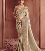 Beige silk blend embroidered saree