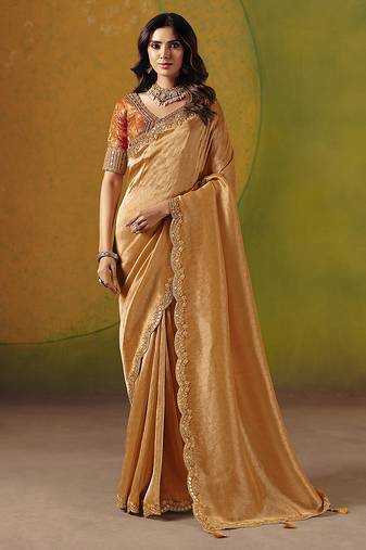 Peach embroidered silk blend saree