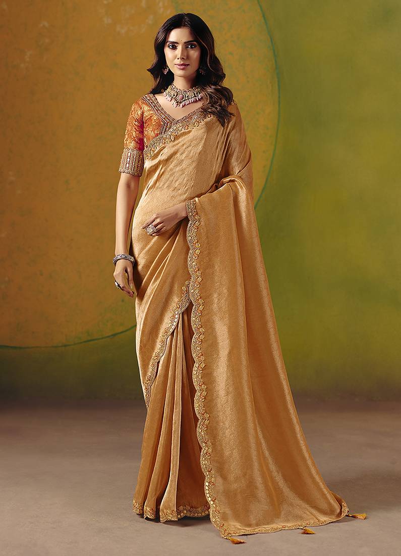 Peach embroidered silk blend saree