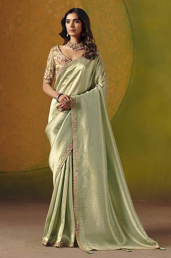 Pista green embroidered silk blend saree