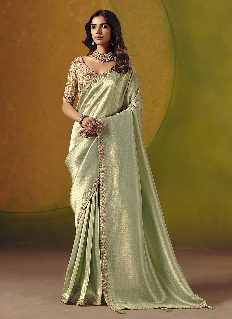 Pista green embroidered silk blend saree