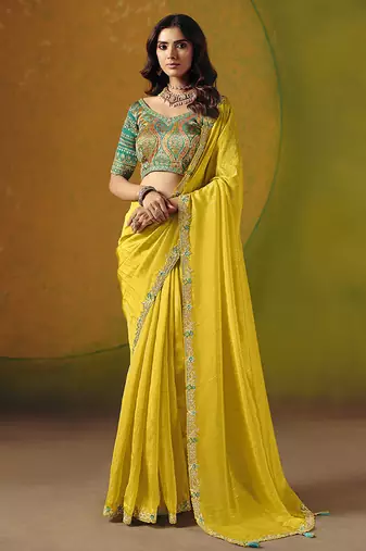 Yellow embroidered silk blend saree