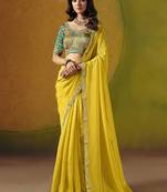 Yellow embroidered silk blend saree