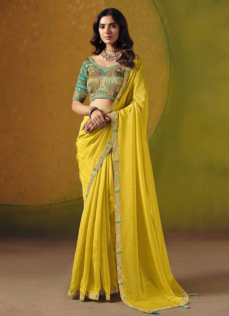 Yellow embroidered silk blend saree