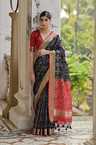 Black soft silk pochampally ikkat weaving saree with contrast blouse piece