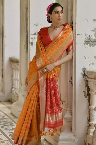 Orange soft silk pochampally ikkat weaving saree with contrast blouse piece