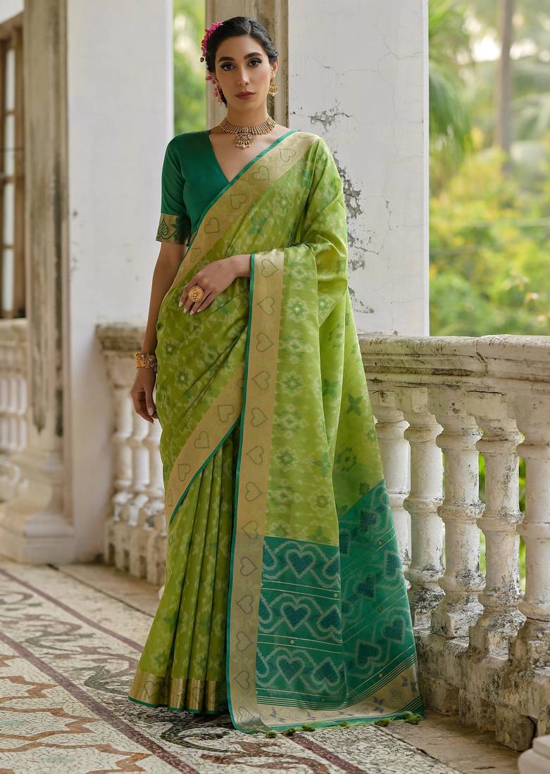 Green soft silk pochampally ikkat weaving saree with contrast blouse piece