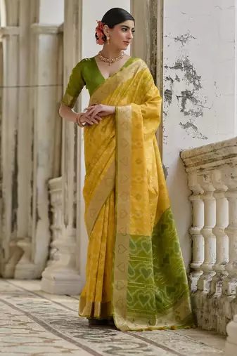 Yellow soft silk pochampally ikkat weaving saree with contrast blouse piece