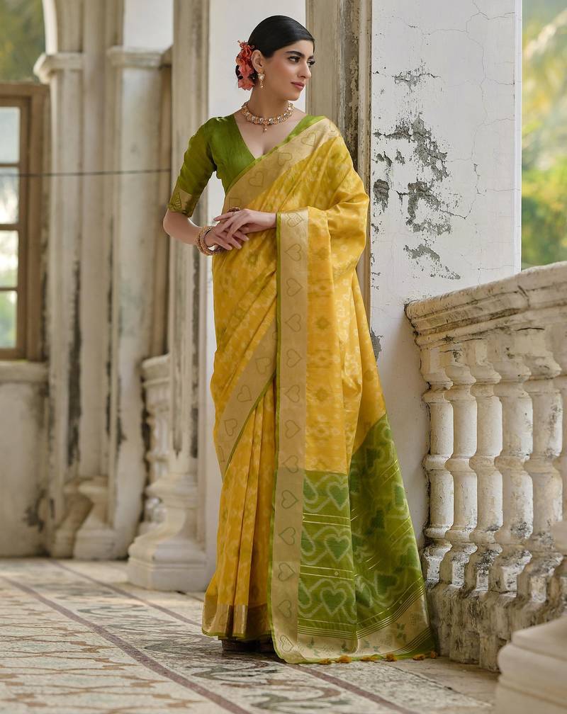 Yellow soft silk pochampally ikkat weaving saree with contrast blouse piece