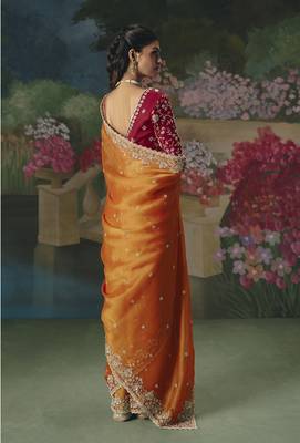Fancy fabric embroidered saree in orange 4