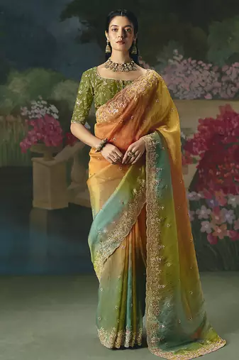 Fancy fabric embroidered saree in multicolor