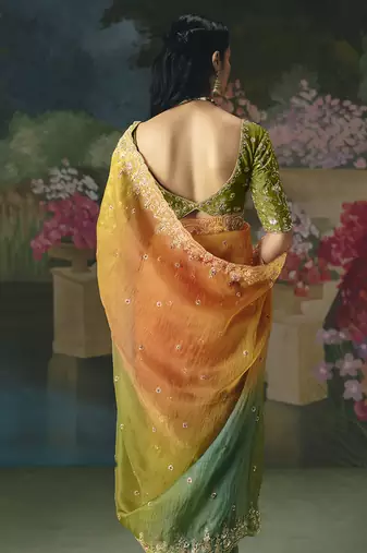 Fancy fabric embroidered saree in multicolor