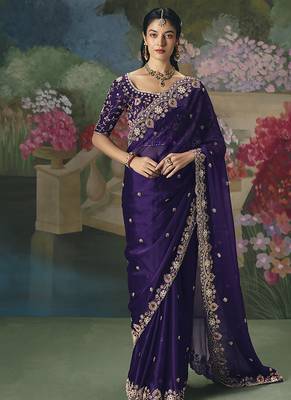 Fancy fabric embroidered saree in purple 1