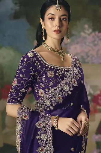 Fancy fabric embroidered saree in purple