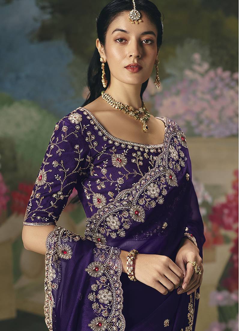 Fancy fabric embroidered saree in purple