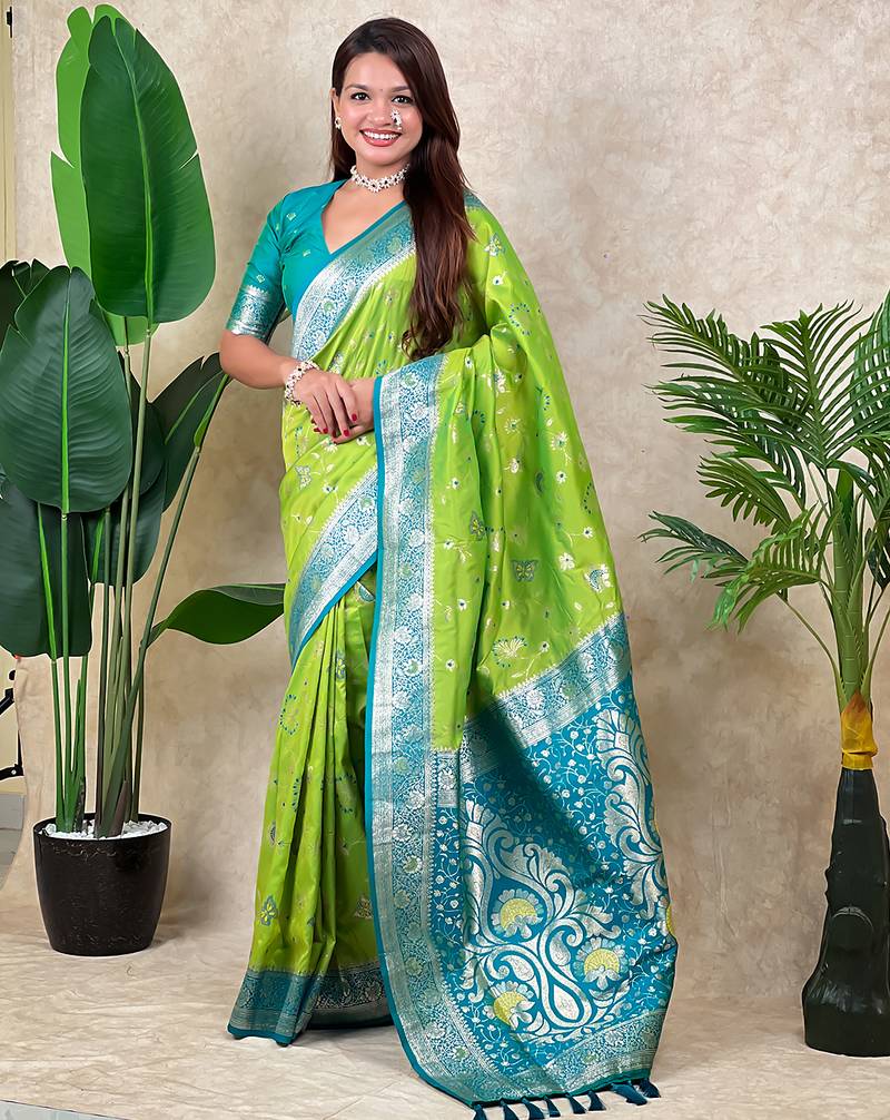 Light green banarasi silk zari woven saree with contrast blouse piece