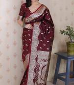 Maroon banarasi silk zari woven saree with matching blouse piece