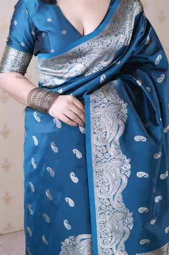 Teal banarasi silk zari woven saree with matching blouse piece