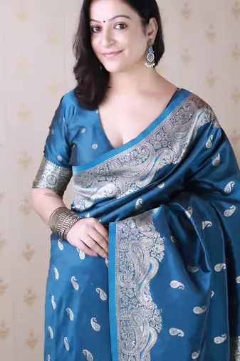 Teal banarasi silk zari woven saree with matching blouse piece