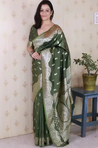 Green banarasi silk zari woven saree with matching blouse piece