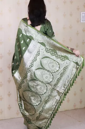 Green banarasi silk zari woven saree with matching blouse piece