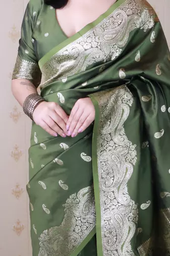 Green banarasi silk zari woven saree with matching blouse piece
