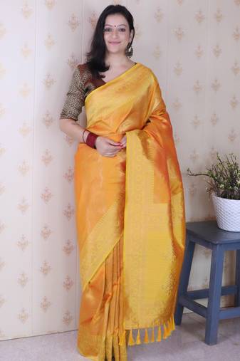 Mustard banarasi silk leheriya zari woven saree with contrast blouse piece