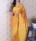 Mustard banarasi silk leheriya zari woven saree with contrast blouse piece