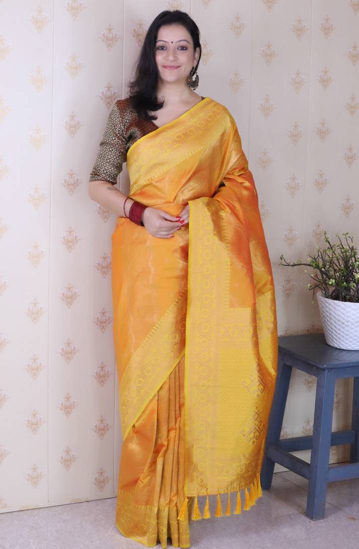 Mustard banarasi silk leheriya zari woven saree with contrast blouse piece