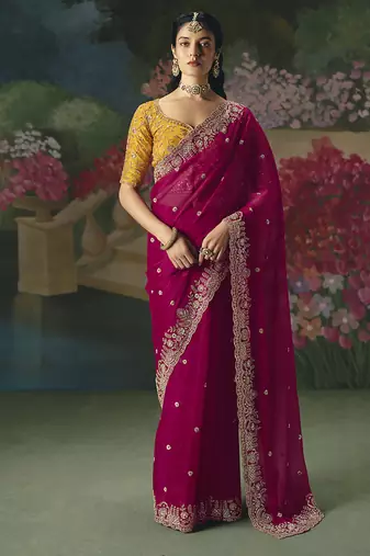 Fancy fabric embroidered saree in rani pink