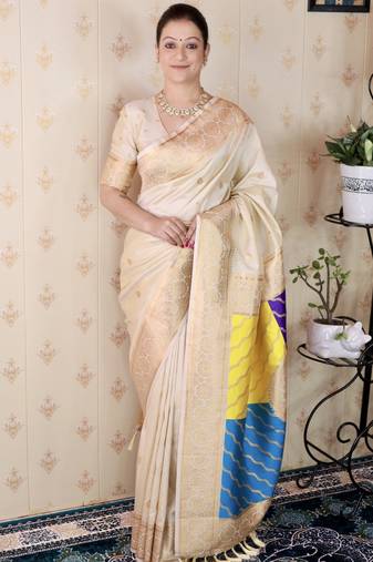Off white banarasi silk zari weaving saree with matching blouse piece