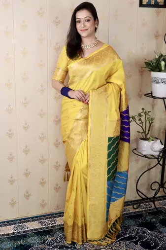 Yellow banarasi silk zari weaving saree with matching blouse piece