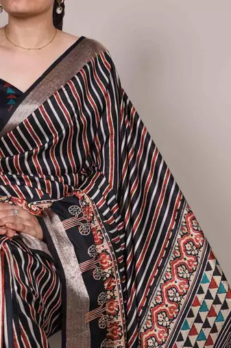 black tussar silk printed saree with viscose border