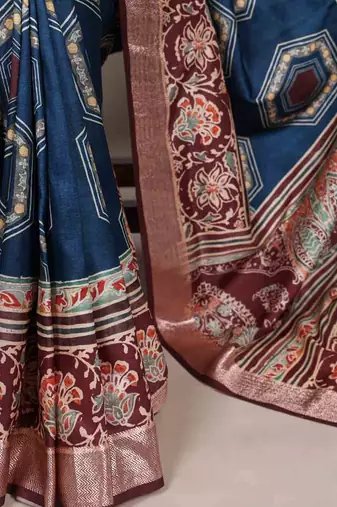 teal tussar silk printed saree with viscose border