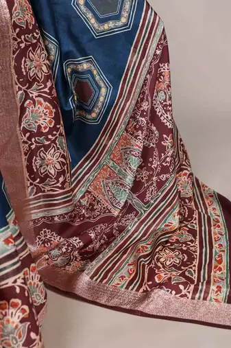 teal tussar silk printed saree with viscose border