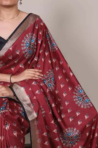 maroon tussar silk printed saree with viscose border