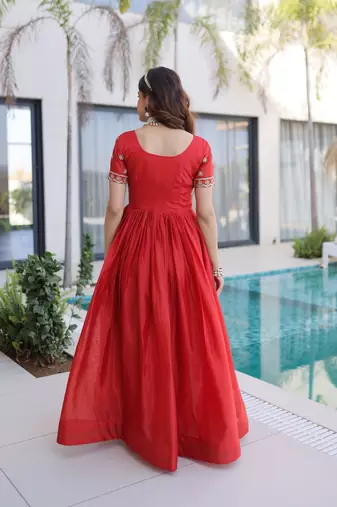 Orange women ho fabric sequins & zari embroidered gown with pipe beads work