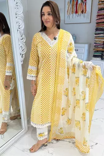 Beautiful yellow cotton kurta set with blue floral strippedroidery