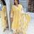 Beautiful yellow cotton kurta set with blue floral strippedroidery