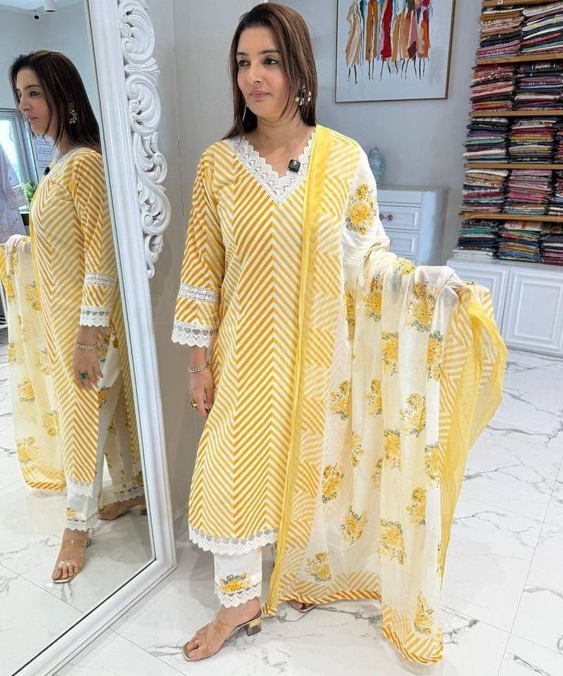 Beautiful yellow cotton kurta set with blue floral strippedroidery