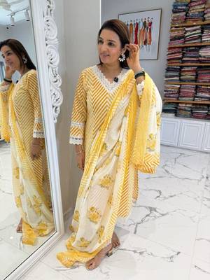Beautiful yellow cotton kurta set with blue floral strippedroidery 2